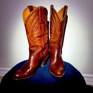 Frye cowboy boots slightly broken in.     Note they are B width